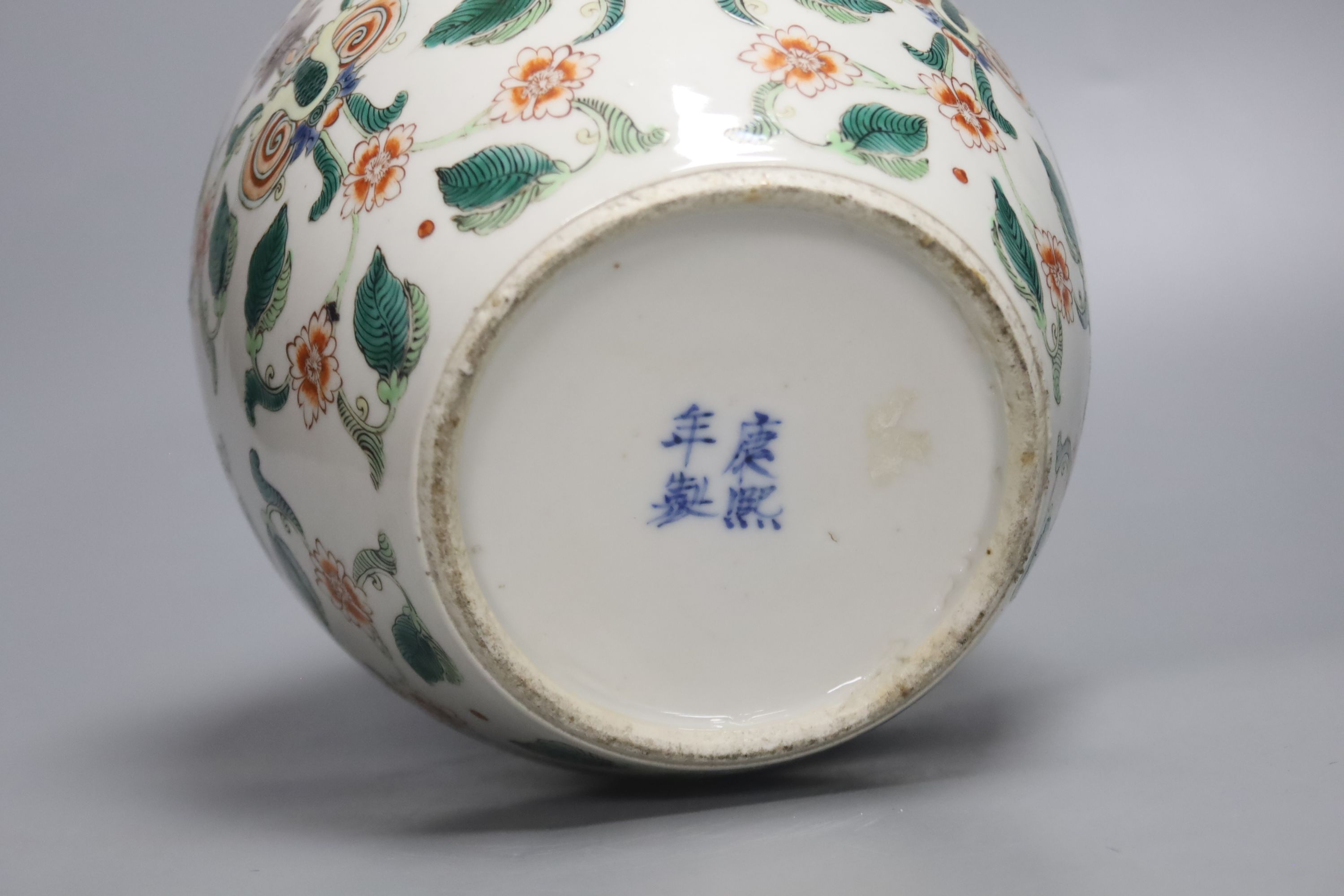 A 19th century Chinese famille verte jar and cover, 22cm high including cover